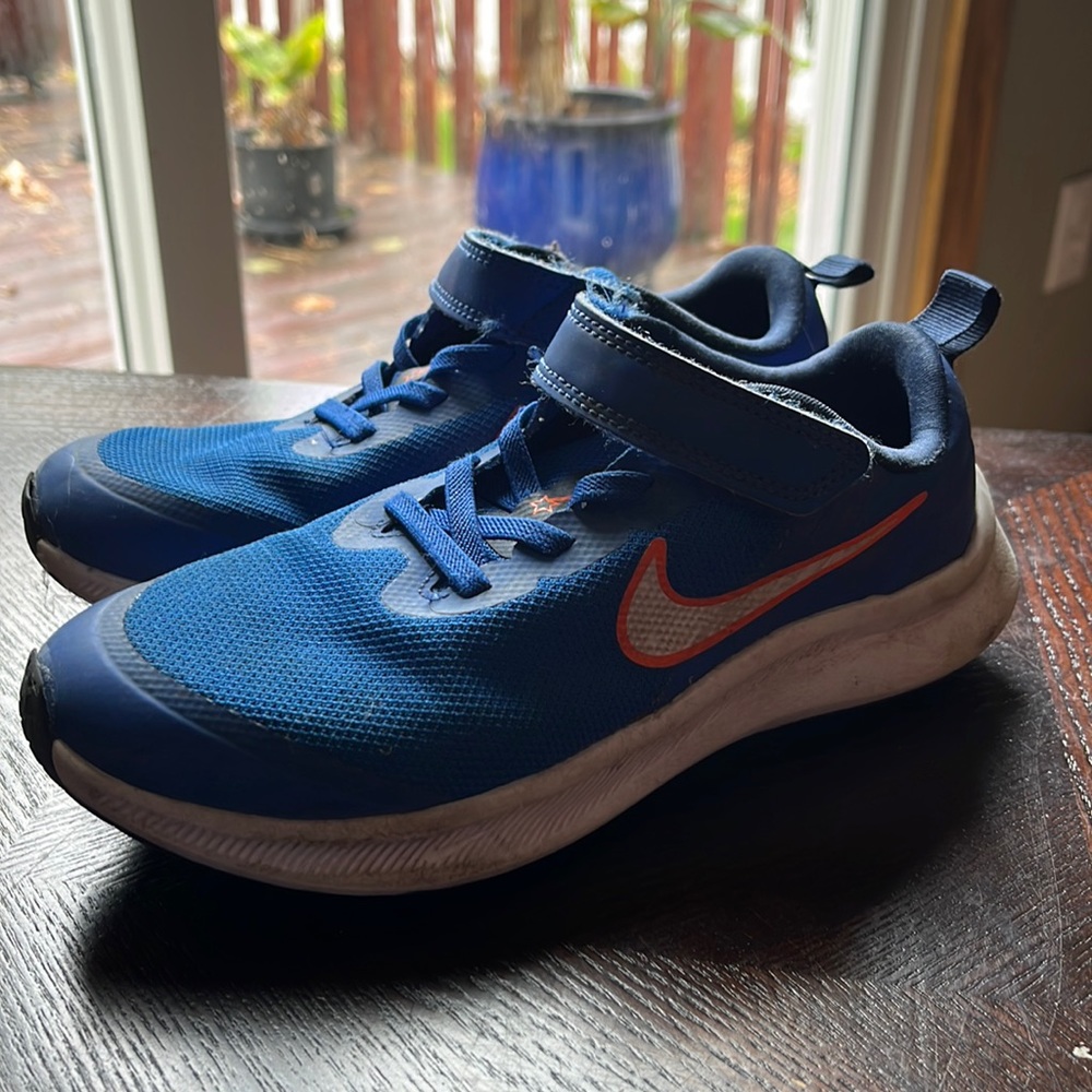 Nike Starrunner blue and orange size 2y